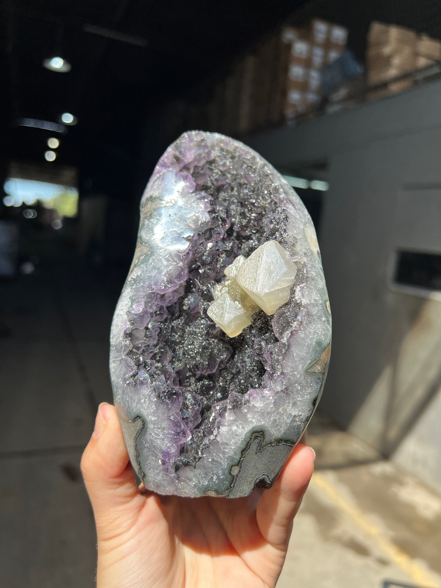 Black goethite amethyst and calcite specimen