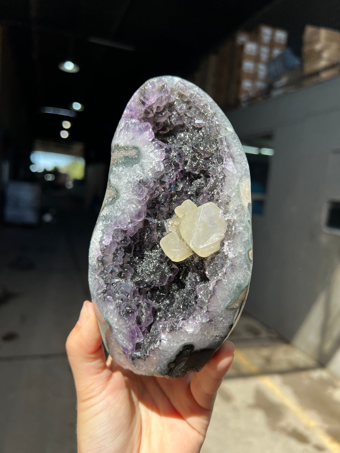 Black goethite amethyst and calcite specimen